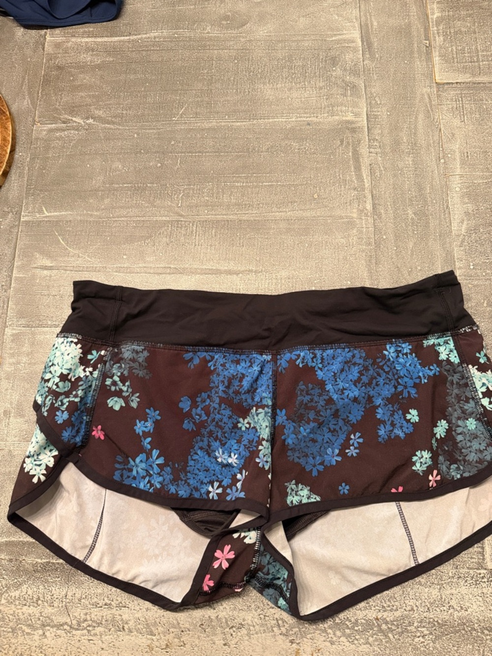 Lululemon Black Floral Athletic Shorts with Blue Accents